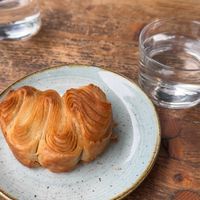 Super tasty vegan plain croissant that was a veeg welcome and  pleasing snack on our journey 😁  at Kaf in Copenhagen