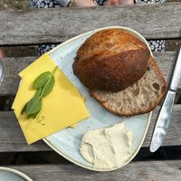 Sourdough bun with whipped butter and cheese at Kaf in Copenhagen