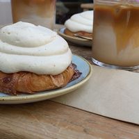 “Kaf buns” with strawberries and iced oat latte  at Kaf in Copenhagen