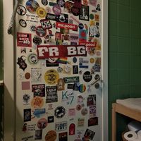 Stickers at the restroom door at Kaf in Copenhagen