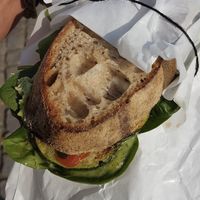 Excellent greek "cheese" & zucchini sandwich with avocado, on sourdough bread.  at Kaf in Copenhagen