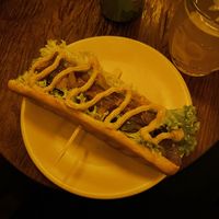 Hot dog with mustard, caramelized onions and pickles 😍.   at Blatouch in Prague
