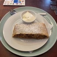 Apple cinnamon strudel cake with a side of whipped cream  at Blatouch in Prague