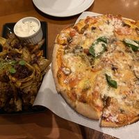 Potato skins and The Luciano pizza   at Tutto Bene in Christchurch