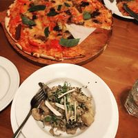 Vegan pizza (with vegan sausage and cheese) and mushroom gnocchi  at Tutto Bene in Christchurch