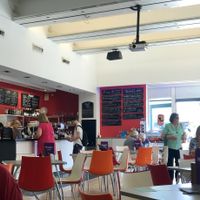 Interior and specials board with 2 vegan dishes at Phoenix Cafe Bar in Leicester