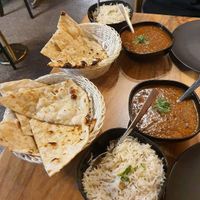 Garlic Naan (is vegan), Dahl Makhani (mark vegan checkbox when ordering from QR code) and zeera rice at Eden Garden Indian Cuisine in South Brisbane