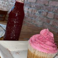 pink vanilla cupcake and blood orange soda   at Right Path Organic Cafe in New London
