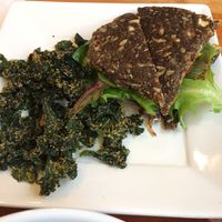 Sun burger on onion bread with kale chips at Right Path Organic Cafe in New London
