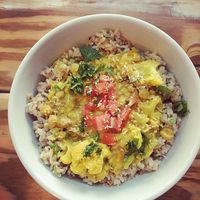 Coconut, mango, cauliflower, chickpea curry over rice. at Right Path Organic Cafe in New London