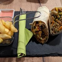 Curry 'chicken' wrap. Fries with pink mayo. at Veggiezz - Am Salzgriess in Vienna