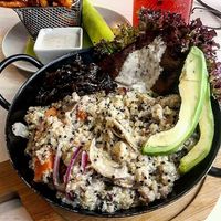 I had the seitan steak bowl, creamy mushroom quinoa, caramelized onions, avocado, teriyaki seitan steak and aside of sweet potato fries and vegan herb mayonnaise.  at Veggiezz - Am Salzgriess in Vienna