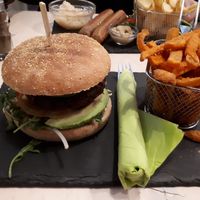 A glutenfree burger made if pea-protein and sweet potatoes chips at Veggiezz - Am Salzgriess in Vienna
