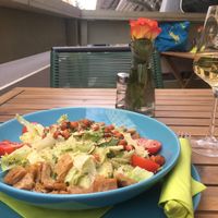 Cesar salad and vegan white wine  at Veggiezz - Am Salzgriess in Vienna