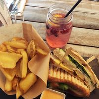 Club sandwich, fries, red fruit citronnade at Veggiezz - Am Salzgriess in Vienna
