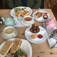 Paninis, wedges, fritters (come with humus and chilli sauce) , teas. The only sauce that isn’t vegan is the mayo (pictured with the wedges) at The Veggie Cafe in Ilkley