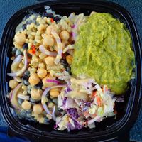 Build-your-own bowl with baked potato base. Topped with corn salsa, black beans, chickpeas, onions, tahini, and cilantro lime salsa. at Grazers Restaurant in Kent