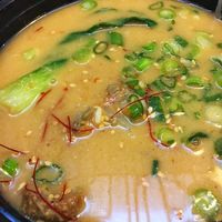 Spicy ramen with broth at Ramen Hood in Los Angeles