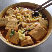 spicy sesame soup with stinky tofu over noodles (麻辣臭豆腐蓋麵 on menu) at Huan Xi in Kaohsiung