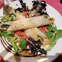 Asparagus on tomato sauce at Dona Flor Cafe in Cascais