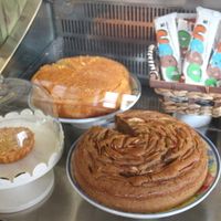 Two big vegan cakes and one small non-vegan cake.  at Dona Flor Cafe in Cascais