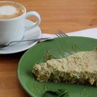 Cappucino with vegan milk and raw avocado pie.  at Dona Flor Cafe in Cascais