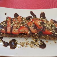 Tartine - Strawberry, chocolate and homemade glutenfree granola at Dona Flor Cafe in Cascais