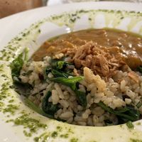 Curry with garbanzo beans, spinach and fried onion at Dona Flor Cafe in Cascais