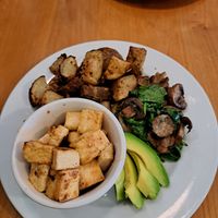 Tofu, potatoes, avocado, and sauteed mix of mushrooms/spinach/garlic. at Shine Cafe in Victoria