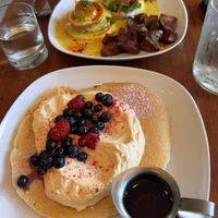 Pancakes with peach cream, eggs benedict  at Epif in Portland