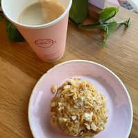 Oat Milk Cappuccino, Bienenstich Donut at Brammibal's Donuts - Maybachufer in Berlin
