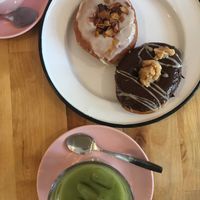 Maple smoked coconut and chocolate peanut fudge donuts, matcha latte at Brammibal's Donuts - Maybachufer in Berlin