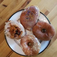 Salted caramel, cinnamon and sugar, maple and bacon, and lemon and bergamot flavored donuts at Brammibal's Donuts - Maybachufer in Berlin