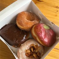 Boston cream, cinnamon sugar, raspberry matcha & maple smoked coconut at Brammibal's Donuts - Maybachufer in Berlin