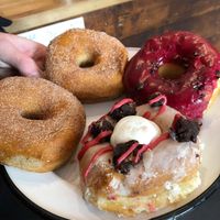 Red Currant, cinnamon sugar and red velvet donuts at Brammibal's Donuts - Maybachufer in Berlin