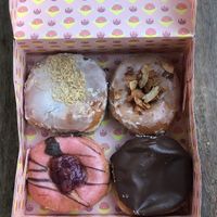 Plum, maple/coconut, cherry, boston at Brammibal's Donuts - Maybachufer in Berlin