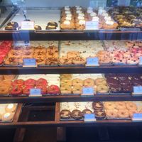 Pineapple coconut, orange curd, hibiscus, maple smoked coconut, macadamia caramel,white choc liquorice, cinnamon sugar, raspberry pistachio, lime basil, boston cream, choc peanut at Brammibal's Donuts - Maybachufer in Berlin