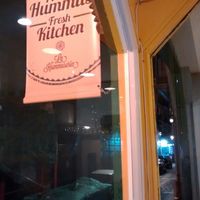 sign at La Hummuseria in Madrid