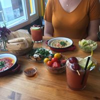 2 hummus, 2 tapas and 2 drinks. at La Hummuseria in Madrid