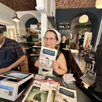 Owner and her cookbook!   at Mezzaluna in Turin