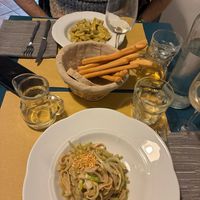 Agnolotti del plin e tagliatelle alla nocciola e puntarelle at Mezzaluna in Turin