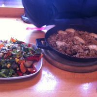 vegan rice pan with mushrooms and salad at Subrosa Kneipenkollektiv in Kiel