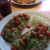Berry Smoothie and Avo and Tomato on toast - very nice.  at Books & Brunch in Bruges