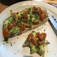 Half eaten (sorry!) avo on toast at Books & Brunch in Bruges
