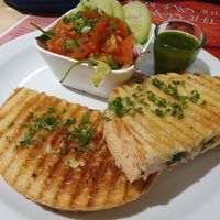 The XL mushroom toast, delicious! With pesto sauce and salad for 15,50€ at Books & Brunch in Bruges