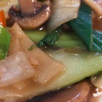 Seasonal green vegetables with garlic sauce at Yak Tibetaans Restaurant in Oostende