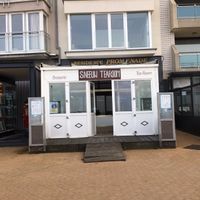 Storefront of Sneeuw Tearoom. at Yak Tibetaans Restaurant in Oostende