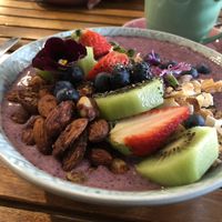 Blueberry Banana and Açaí Smoothie Bowl with Granola at Betty's Bohemian Beach Cafe in Port Douglas