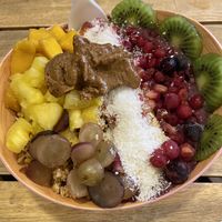 Açai Berry bowl with coconut milk and almond butter on top  at Milk Away in Sevilla