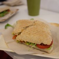 Avo, tomato, pesto and rocket sandwich. Ft: green smoothie.  at Milk Away in Sevilla